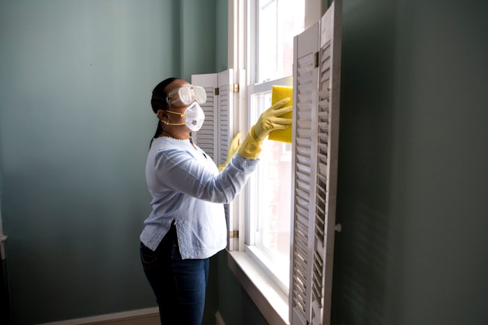 Home services professional cleaning and maintaining a property